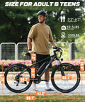 Adult male with helmet stands beside Racer Electric Mountain Bike For Adults With Peak 750W Motor, 21 Speed Gearing, 26X2.1 inch tires.