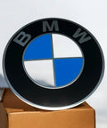 BMW 58mm Wheel Center Cap Emblem Genuine Hubcap Logo Roundel Sticker Replacement on box, black and blue design