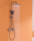 Wall Mounted Exposed Shower System with Tub Spout 90° Rotating Gun Gray with top and handheld spray in action.