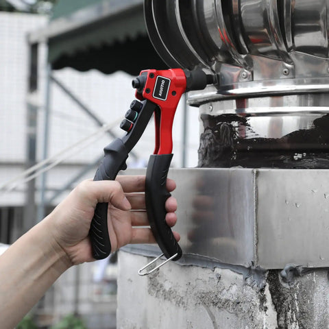 Manual Pop Rivet Gun Kit With 200 Aluminum Rivets In Four Sizes And Four Drill Bits For Easy Installation held against metal surface.