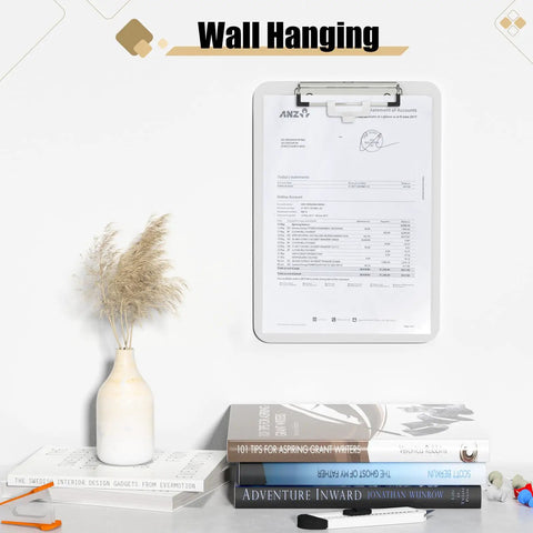 White Plastic Clipboard With Pen Holder And Low Profile Clip 12.5 By 9 Inch Writing Surface A4 And 8.5 By 11 Inch Letter Size Durable Polypropylene Clipboard For Nurses Students Office And On The Go hanging on wall with documents.