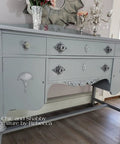 Vintage dresser painted with Manatee Gray Chalk Finish Furniture Paint for DIY Lovers, matte chalk paint, light gray with blue undertones.