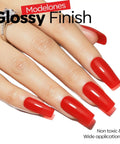 Manicured nails with glossy neon red finish using Red Gel Nail Polish 15ml HEMA Free Neon Summer Soak Off UV Gel Long Lasting