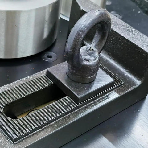 Detail of the clamp mechanism on Badass Heavy Duty Electric Rebar Bender With 1-1/4 Inch Max Diameter Steel Bending Table Machine 110V 3000W.
