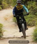 Rider on a Dual Motor Electric Bike For Adults With 5000W Peak Power And 45 MPH Top Speed on a rough trail