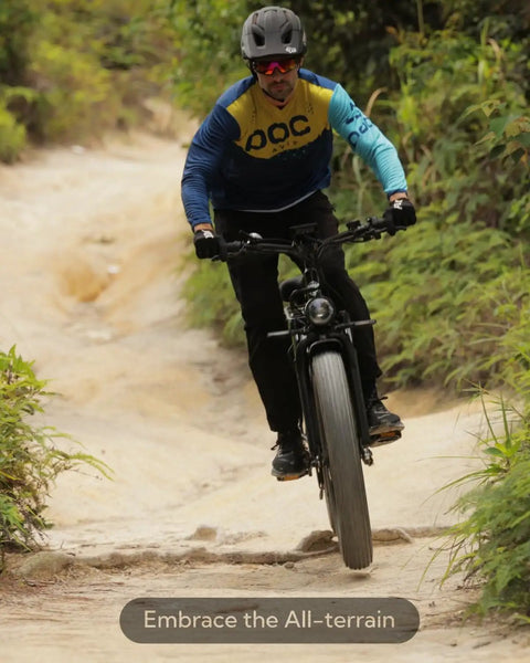 Rider on a Dual Motor Electric Bike For Adults With 5000W Peak Power And 45 MPH Top Speed on a rough trail