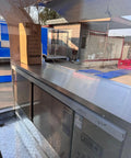 Kickstart Your Mobile Eatery Hustle With This Custom Food Vending Trailer And Commercial Catering Cart featuring stainless steel counters and refrigeration.