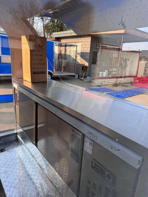 Kickstart Your Mobile Eatery Hustle With This Custom Food Vending Trailer And Commercial Catering Cart featuring stainless steel counters and refrigeration.