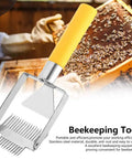 Stainless Steel Beehive Knife Scraper and Honey Uncapping Fork for Beekeeping Equipment with yellow handle, close-up.