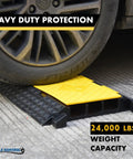 Car wheel on Beefy 3 Channel Cable Protector Ramp With 35 Inch Length Durable Rubber Wire Guard Black And Yellow 24000 Lbs Load Capacity Heavy Duty Cord Cover For Industrial Jobs Parking Lots And Construction Sites
