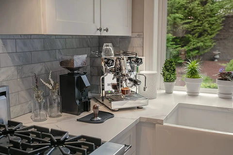 Espresso Machine And Eureka Mignon Silenzio 55 Grinder Bundle in stainless steel and chrome finish on a kitchen countertop.