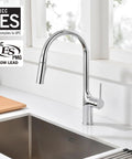 SUMERAIN Kitchen Faucet with Pull Down Sprayer Dual Mode Brushed Gold in modern kitchen setting with stainless steel sink.