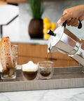 Stovetop Espresso Maker For Home Brewing And Camping Italian Moka Pot In Classic Aluminum 6 Cup Mocha Pot pouring coffee