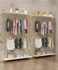 Hella Sturdy Two Tier Industrial Garment Rack With Thick Wood Shelf And Durable Metal Frame wall mounted double hanging rods holding assorted clothing.