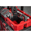 Gutsy Modular Tool Tray For Tradesmen Heavy Duty Plastic Organizer showing red bin being used with tools and gloves.