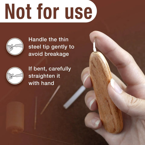 Ergonomic Wooden Needle Threader For Hand Sewing With Hardwood Handle And Stainless Steel Hook For No Fuss Easy Threading 1 Cm Extended Tip That Fits Small Eye Needles And Sewing Machines Savina being held by a hand.