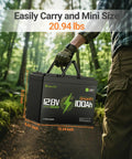 12V 100Ah LiFePO4 Battery Group 24 With Bluetooth Real Time Monitoring And 100A BMS carried by person in forest
