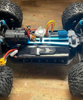RC truck chassis with 3S LiPo Battery 11.1V 5200mAh 120C With XT60 And TRX Plugs installed, showing wiring and suspension details