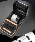 Cool Retro Label Printer With Bluetooth 5.0 Connectivity And Compact Design Perfect For Home Office Organization Tasks features inkless thermal printing technology and visible paper roll.