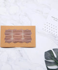 Brown DIY Cookie Boxes With Window 50 Pack Portable Paper Bakery Boxes on marble surface