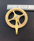 Replacement Grandfather Clock Pulley for Cable Movements One And Three Quarters Inch DIY Clock Assembly Kit next to ruler