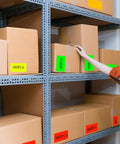 Color Code 3x5 Inch Fluorescent Rectangle Labels 8 Bright Colors For Envelopes Files Inventory And Home Office Organization 240 Labels On 80 Sheets Easy Tagging And Color Coding shown on boxes in warehouse