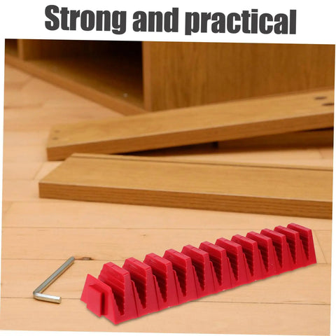 Red 12 Piece Modular Wrench Organizer Tray for workbenches, garages, and DIY projects on a wooden surface