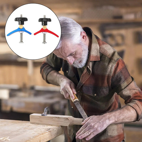 Man using woodworking hold down clamp set with T slot clips and track clamp system for carpenter use, showing blue and red pressure plates
