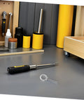 Heavy Duty Stainless Steel Eye Bolts With Nuts And Washers M10x60 threaded screw hook on a workshop table with tools.