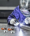 Heavy Duty Magnetic Welding Ground Clamp With Super Fast No Screw Tool Free Setup For Reliable Arc Safety And Solid Grounding Connection On Any Metal Spot For Pros Or Travelers Who Need Quick Fix. Two clamps seen with welder.