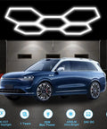 Hexagon Garage Lights 60W 24V Daylight White 6500K Plug And Play LED Kit installed above a car in a workshop