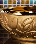 Close-up of Super Slick Round Vessel Sink For Bathroom Vanity Killer Gold Ceramic Countertop Wash Basin with leaf design.