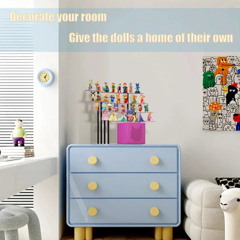 Ultimate Pink Metal Toniebox Stash Holder For 20 To 35 Tonies with dolls displayed on a blue dresser in a modern room.