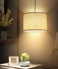 Plug In Pendant Lights With Smooth Dimmer Switch And 15 Foot Braided Hemp Cord For Super Chill Bedroom Or Living Room Vibes Two Pack Quick Hook Up Beige Linen Shades illuminated over a bedside table with decor.