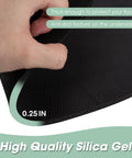 Close-up of hand holding Round Rubber Floor Pad For Recliners, Non Slip Floor Protector Mat, showing anti-skid texture, 0.25 inch thick