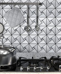 10-Sheet Peel And Stick Backsplash Tile Set For Kitchen Fireplace And Bathroom Windmill Glass In Brushed Silver Aluminum Composite 3D Metal Look With Ultra Strong 3M Adhesive installed in kitchen with stove and utensils