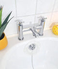 Bathtubs Drain Stoppers with Leakproof Designs, Clear positioned near faucet in modern bathroom setting with plants.