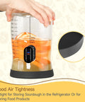 Hand holds Large Capacity Sourdough Starter Kit with 50oz jar featuring airtight silicone lid with fermentation ingredients inside.