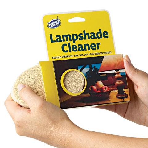 Hands holding Easy To Use Sponge Lamp Shade And Fabric Cleaner For Delicate Fabrics And Lampshades, No Fuss Dust, Dirt, And Pet Hair Removal