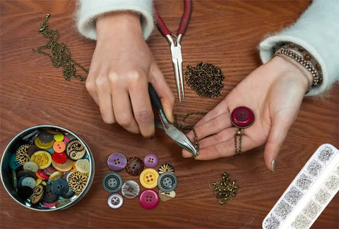 All In One Jump Ring Jewelry Making Kit With 1200 Pieces Dull Silver And Bright Silver Pliers Tweezers Lobster Clasps Ring Opener in use