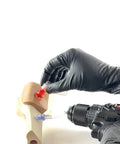 EZ-IO Compatible IO Drill Trainer Intraosseous Driver for Medical Instructors showing drill and training bone setup.