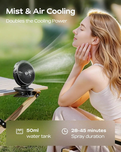 Portable Misting Clip On Fan With USB C Rechargeable Battery, misting on table outdoors next to person enjoying cool breeze.