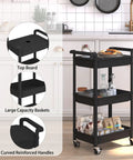Black Three Tier Rolling Cart With Lockable Casters And Covered Top Board in a kitchen setting showcasing its storage capability.
