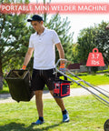 Upgraded MMA-250A 110V Portable Stick Welder With IGBT Inverter in a garden setting, person holding it next to lawnmower, 3.7 lbs.