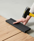 Using Universal Tapping Block For Vinyl Plank And Laminate Floors Reversible Double Sided Wood Flooring Tool to install floor.