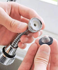 Hands assembling Eight Pack Stainless Steel Hose Filter Washers With Screen Strainer For Three Quarter Inch Garden Hose Connectors.