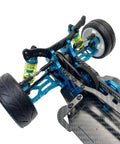 Close-up of 1 To 10 Scale Alloy And Carbon D4 AWD Drift RC Car Frame Kit showing rear suspension and wheel assembly.