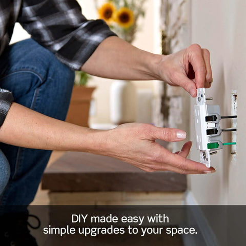 No Sweat 15 Amp Tamper Resistant Duplex Wall Outlet 10 Pack Lever Style Wire Connectors With Bold Color Markings For Rapid Safe Circuit Installations In Crisp Clean White being installed in a wall.