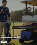Man placing golf gear into golf cart with Ultimate Golf Trunk Organizer For Gear, Shoes And Accessories For Men And Golfers