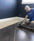 Installer using Ultra-Lite 9 Inch Flooring Cutter For Vinyl Plank, LVP, Laminate, Engineered Hardwood And Siding, Cuts 9 Inches Wide
